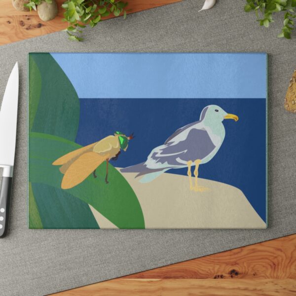 Glass Cutting Board with Greenhead & Dump Duck Illustration.